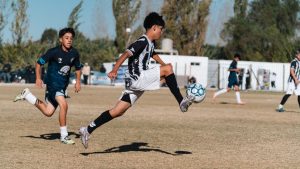 Young athletes competing at a club soccer game