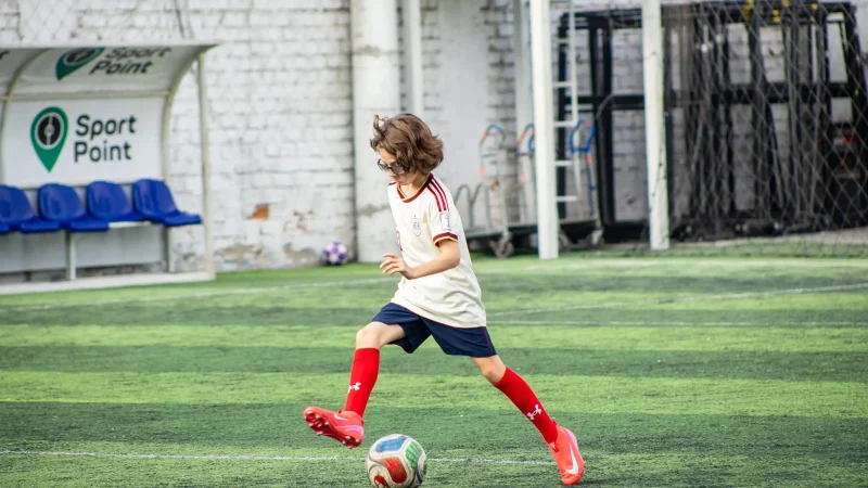 Boy playing soccer.